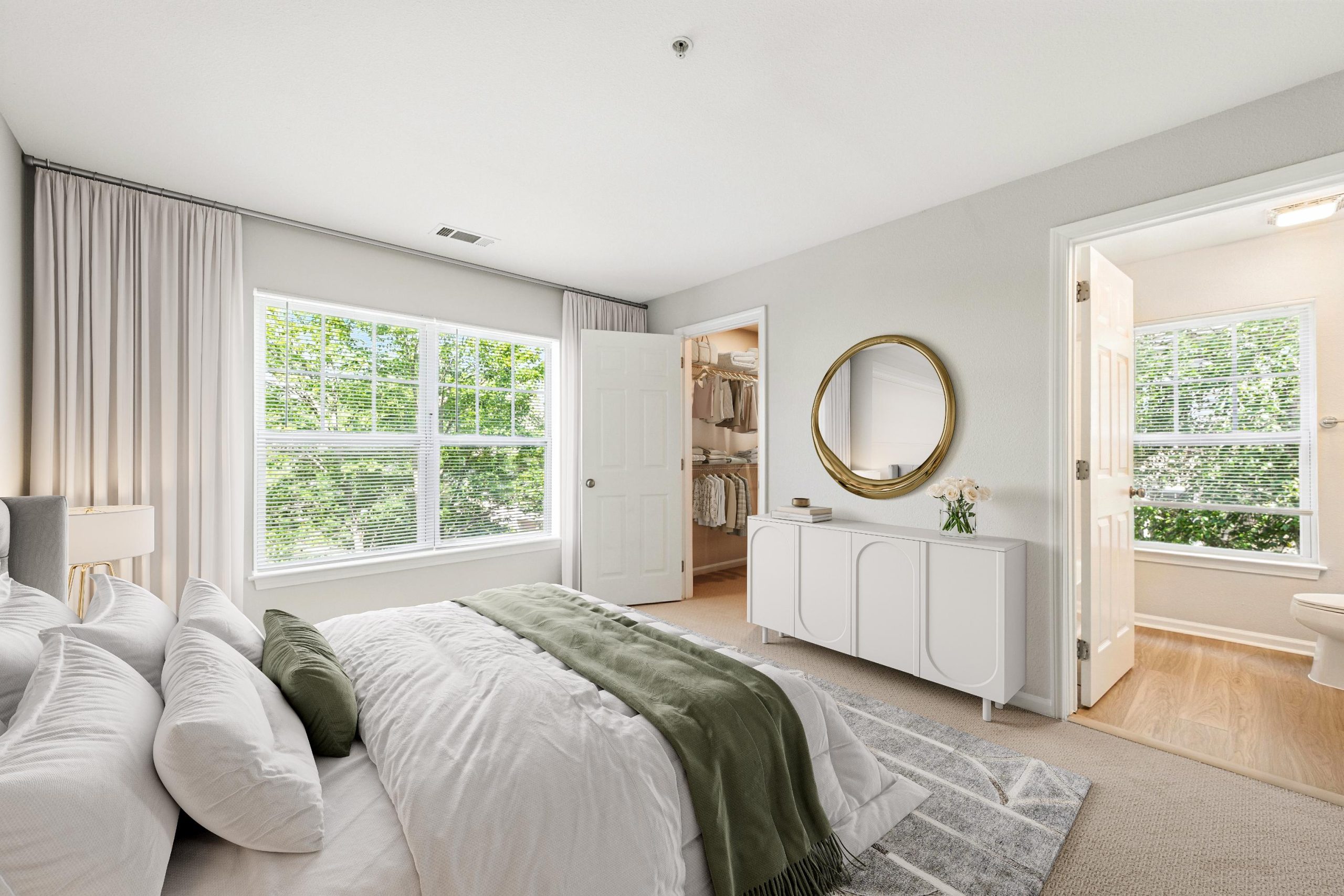 Bedroom with walk-in closet and bathroom